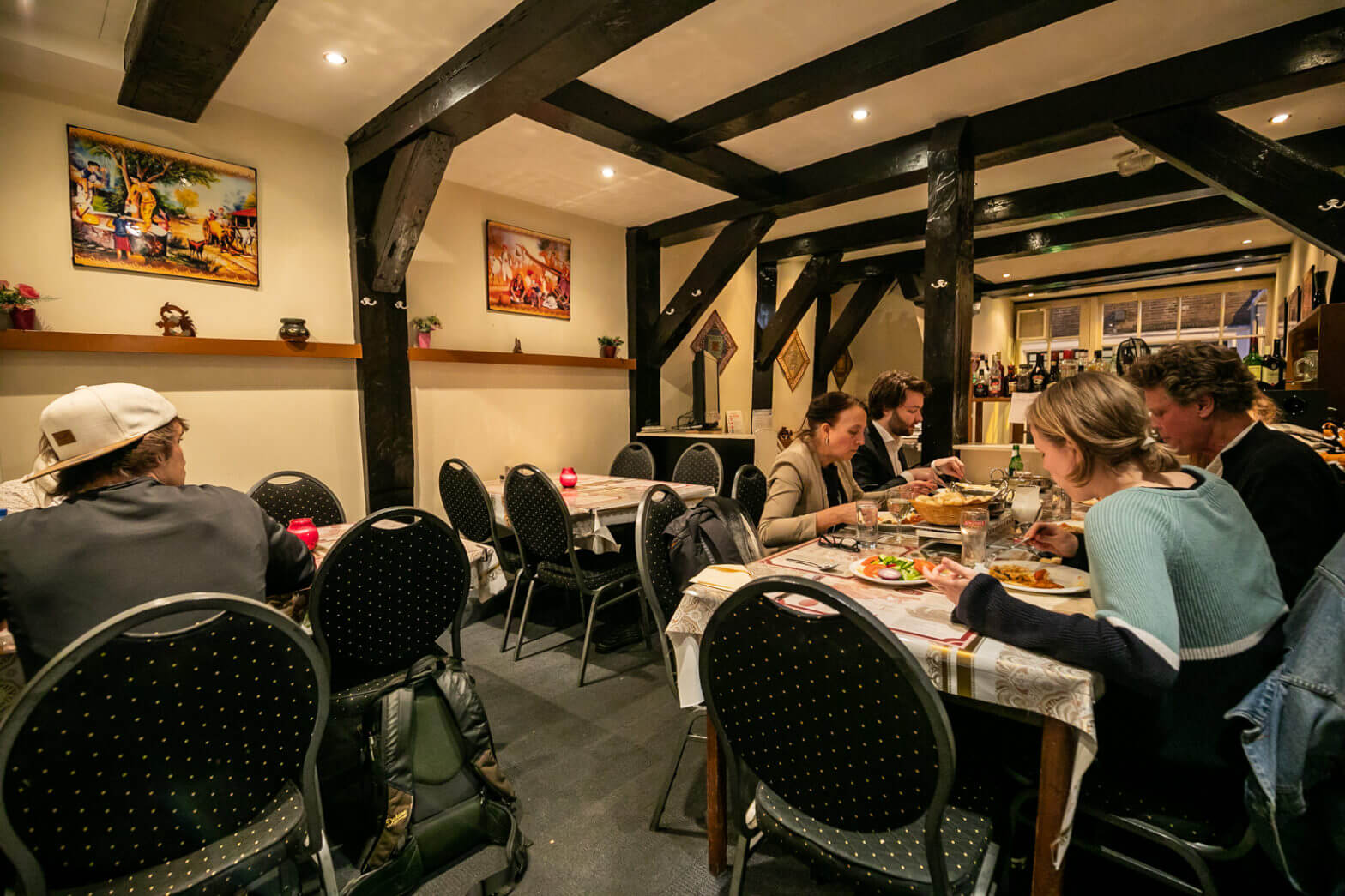 Customers dining at Samrat Indian Restaurant in Amsterdam Customers dining at Samrat Indian Restaurant in Amsterdam